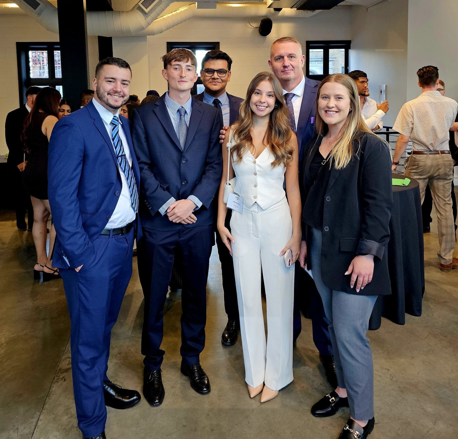 Atlantic Connect team members at a professional event
